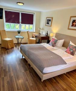 Ένα ή περισσότερα κρεβάτια σε δωμάτιο στο HEINRICHs winery bed & breakfast