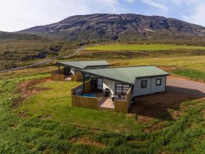 an overhead view of two modular homes on a hill at Efsti-Dalur Cottages in Úthlid