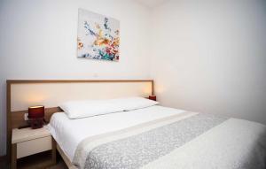 Postel nebo postele na pokoji v ubytování Holiday Home Leon