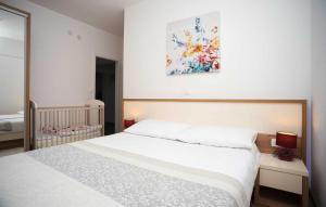 Postel nebo postele na pokoji v ubytování Holiday Home Leon