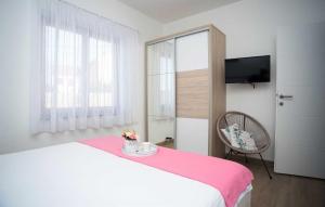 Postel nebo postele na pokoji v ubytování Holiday Home Leon