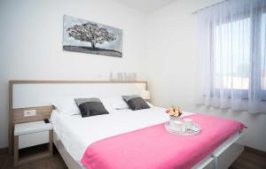 Postel nebo postele na pokoji v ubytování Holiday Home Leon