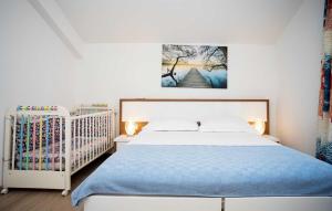 Postel nebo postele na pokoji v ubytování Holiday Home Leon