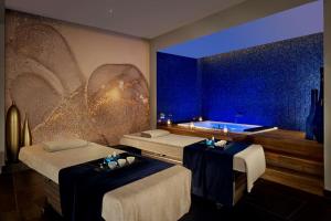 a room with two beds and a bath tub at Grand Hotel Brioni Pula, A Radisson Collection Hotel in Pula +37 photos