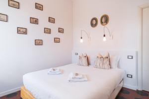 Posteľ alebo postele v izbe v ubytovaní HC - Sunny Apartment in Testaccio!