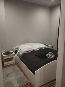 Giường trong phòng chung tại Apartament Rycerska