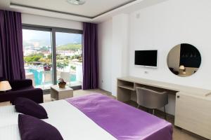 Postel nebo postele na pokoji v ubytování Hotel Ponta Nova