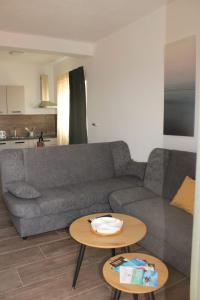 Гостиная зона в Apartman Maslina