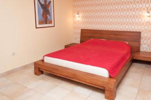 Кровать или кровати в номере Apartments LILA AUREA