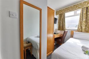 Voodi või voodid majutusasutuse Properties Unique Dene Rooms - Single Room toas +3 fotot