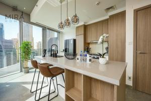 Kuchyň nebo kuchyňský kout v ubytování Mira Holiday Homes - Stylish 1 bedroom in Dubai Marina
