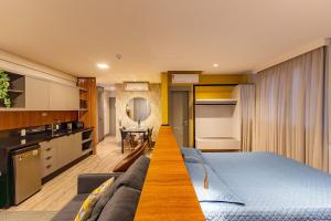 A cozinha ou cozinha compacta de Confortável Loft com Vista para o Mar - Condomínio com Piscina