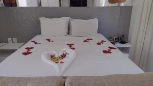 Letto o letti in una camera di Villas do Pratagy Jambo I com Jacuzzy