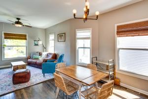 a living room with a table and a couch at Pet-Friendly Home - 6 Mi to Downtown Milwaukee! in West Allis