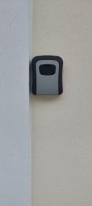a black and white toaster on the side of a wall at Panos & Maria studio! in Kalamata