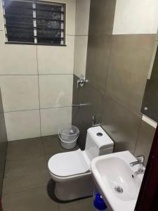 Koupelna v ubytování Uniro Rooms & Packages