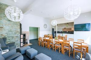 a dining room with a table and chairs at Pension u Jezu in Klášterec nad Ohří