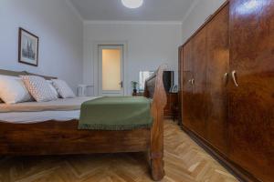 Кровать или кровати в номере Anna's House by Wonderful Italy