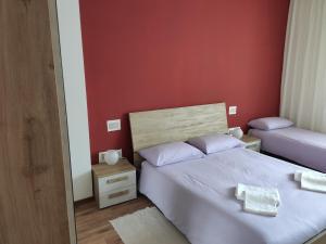 Postelja oz. postelje v sobi nastanitve Albergo Al Trieste