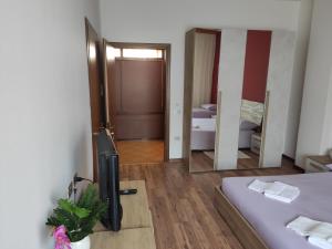 Postelja oz. postelje v sobi nastanitve Albergo Al Trieste