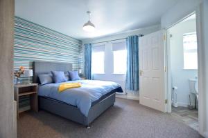 Postel nebo postele na pokoji v ubytování Portmore Holiday Home