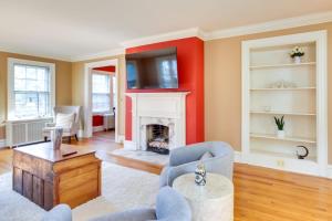 a living room with a fireplace and a tv at Augusta Vacation Rental about 5 Mi to Downtown in Augusta
