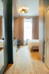 Postel nebo postele na pokoji v ubytování Aparthotel Amella