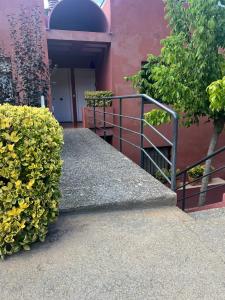 a stairway leading to a building with a door at AP21-Sa Riera in Begur