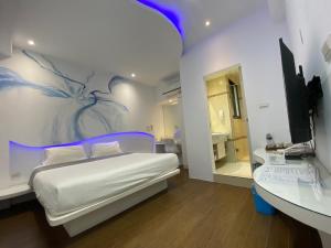 Postel nebo postele na pokoji v ubytování Beauty House Homestay