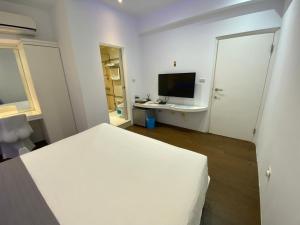 TV a/nebo společenská místnost v ubytování Beauty House Homestay