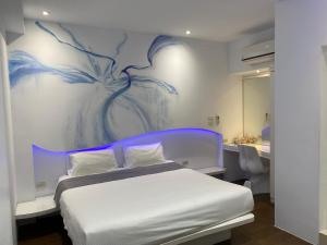 Postel nebo postele na pokoji v ubytování Beauty House Homestay