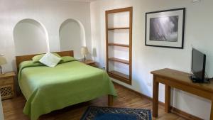 TV a/nebo společenská místnost v ubytování Boutique Hotel Antinea