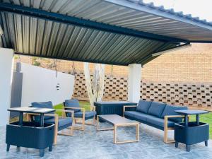 Posezení v ubytování Chimas Guest House