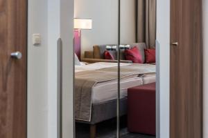 Postel nebo postele na pokoji v ubytování Austria Trend Hotel Europa Salzburg