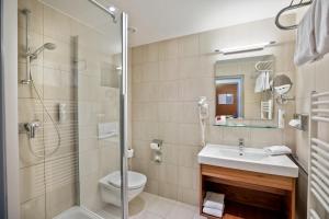 Koupelna v ubytování Austria Trend Hotel Anatol Wien + 27 fotografií