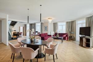 Телевизор и/или развлекательный центр в Austria Trend Parkhotel Schönbrunn Wien