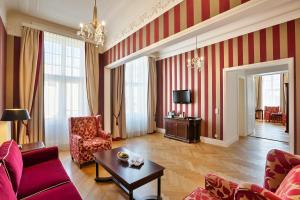 Телевизор и/или развлекательный центр в Austria Trend Parkhotel Schönbrunn Wien