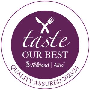 a purple and white sticker with a fork and knife at Binnilidh Mhor B&B in Glenmoriston