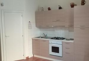 Η κουζίνα ή μικρή κουζίνα στο Dependance Villa Grazia