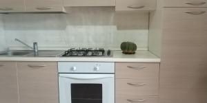 Η κουζίνα ή μικρή κουζίνα στο Dependance Villa Grazia +7 φωτογραφίες