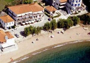 an aerial view of a beach with buildings and the ocean at Hotel Korakakis Beach in Finikounta