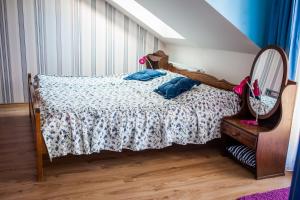 Letto o letti in una camera di Apartmány Batelov