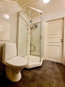 Koupelna v ubytování Koselige leilighet på øya