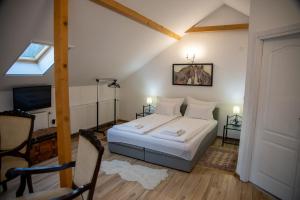 Una cama o camas en una habitación de Apartman Centar