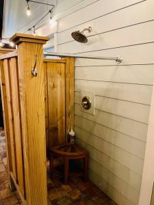 a room with a wooden door and a table at The 2 Bedroom Jacksonville Blue Bungalow in Jacksonville
