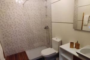 Koupelna v ubytování Figueira Holidays