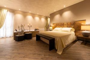Postel nebo postele na pokoji v ubytování Corte Rossetti Relax Assoluto e Luxury Urban Spa + 81 fotografií