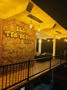 a room with a wall with graffiti on it at Ella Tea Heaven Villa in Ella