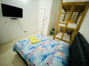Postel nebo postele na pokoji v ubytování Hostal Badillo SV + 37 fotografií