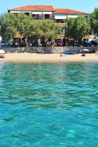 a view of a beach from the water at Hotel Korakakis Beach in Finikounta